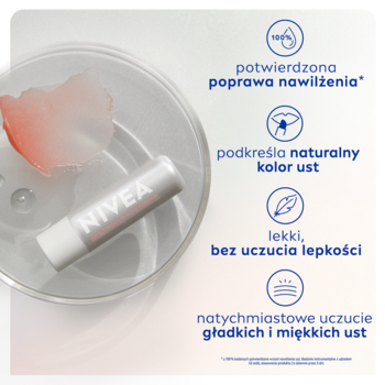 NIVEA Hyaluron Rose nawilżająca pomadka w białym sztyfcie, obok różowy balsam w szklanym naczyniu. Widok z góry.