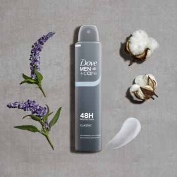 Antyperspirant Dove MEN+CARE Classic 48H, szary spray z lawendą, bawełną i kremem, na szarym tle.
