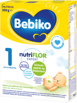 Bebiko 1 nutriFLOR EXPERT, żółte pudełko z dużym niebieskim sercem, mleko początkowe dla niemowląt od urodzenia.