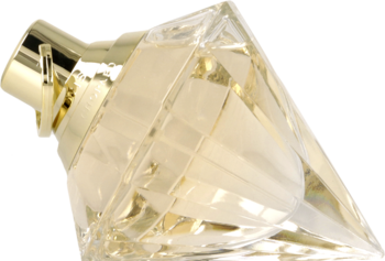 Chopard Brilliant Wish woda perfumowana, złota fasetowana butelka leżąca na boku, widok z bliska pod kątem.