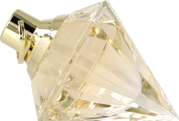 Luksusowa butelka perfum Chopard Brilliant Wish, złocisto-przejrzysta, leżąca pod kątem, z fasetowanym szkłem.