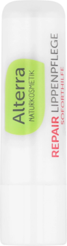 Biała pomadka ochronna Alterra Repair do spierzchniętych ust, w sztyfcie, z zieloną etykietą.