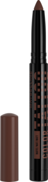 Maybelline Color Tattoo 24H Eye Stix w kolorze brązowym, matowy cień w kredce z otwartą skuwką.