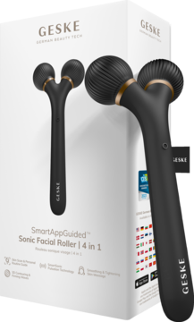 Czarny GESKE SmartAppGuided Sonic Facial Roller 4w1 z złotymi akcentami, częściowo wyjęty z białego opakowania.