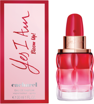 Cacharel Yes I Am Bloom Up! woda perfumowana: czerwony flakon i różowe opakowanie z napisem, obok siebie.