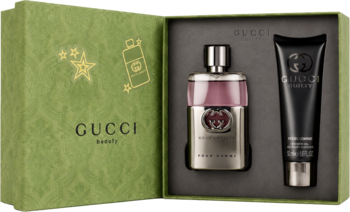 Gucci Guilty zestaw prezentowy: srebrny flakon EDT i czarny żel w zielonym pudełku z świątecznymi zdobieniami.
