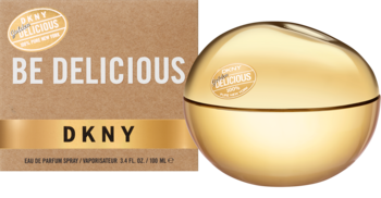 Złote perfumy DKNY Golden Delicious w butelce jabłku obok beżowego pudełka z napisem Be Delicious.