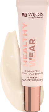 Tubka AA Wings of Color Healthy Wear Glow Mixer 3w1, jasnoróżowa z różowozłotą nakrętką i smugą beżowego produktu obok.