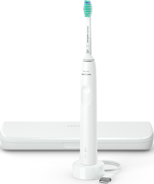 Biała szczoteczka soniczna Philips Sonicare z zieloną końcówką, stojąca w ładowarce, obok etui podróżne.