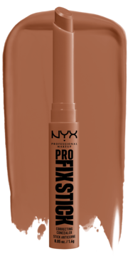 NYX Pro Fix Stick korektor w sztyfcie, odcień cappucino, widok z przodu na tle smugi produktu.