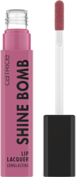 Błyszczący lakier do ust Catrice Shine Bomb, różowy odcień, w przezroczystej butelce z wysuniętym aplikatorem.