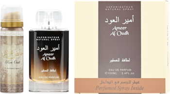 Zestaw zapachowy Lattafa Ameer Al Oudh z wodą perfumowaną 100ml i dezodorantem 50ml, butelki stoją obok beżowego pudełka.