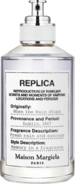 Maison Margiela Replica 'When the Rain Stops' woda zapachowa unisex. Jasnofioletowa butelka z białą etykietą, widok z przodu.