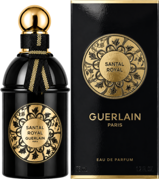 Guerlain Santal Royal EDP z drzewem sandałowym. Czarna butelka z złotym korkiem, wstążką i etykietą, obok pudełko.
