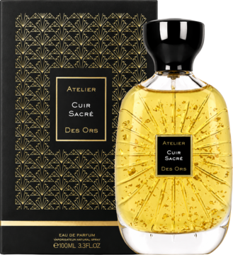 Flakon perfum Atelier des Ors Cuir Sacré, złoty płyn z drobinkami, czarne pudełko ze złotym wzorem, widok z przodu.