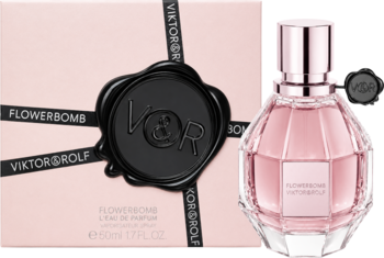 Viktor & Rolf Flowerbomb EDP: różowa fasetowana butelka obok jasnoróżowego pudełka z czarną wstążką i pieczęcią.
