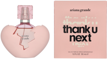 Perfumy Ariana Grande Thank U, Next EDP: różowy flakon w kształcie pękniętego serca i pasujące różowe pudełko.