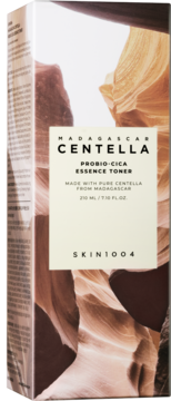 Skin1004 Madagascar Centella Probio-CICA, pudełko odżywczego toniku, beżowa etykieta na wzorze kanionu.