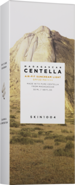 Krem przeciwsłoneczny Skin1004 Madagascar Centella SPF50 w białym opakowaniu z pejzażem górskim.