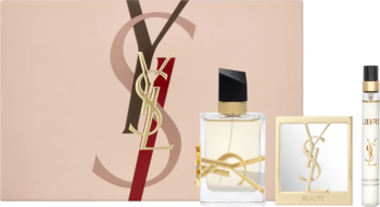 Zestaw YSL Libre: elegancka EDP, podróżna perfuma i lusterko, eksponowane przed beżowym pudełkiem z logo.