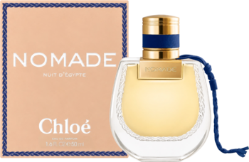 Chloé Nomade Nuit D'Egypte woda perfumowana. Bursztynowa butelka z niebieskim sznurkiem i złotą zakrętką, obok beżowe pudełko z granatową obwódką.