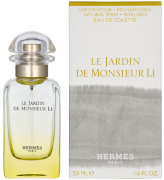 Hermès Le Jardin de Monsieur Li woda toaletowa: szklana butelka z żółtym płynem, obok białe pudełko z szarym wzorem.