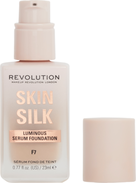 Revolution Skin Silk Luminous Serum Foundation F7 w szklanej butelce z pompką, widok z przodu, obok nakrętka.