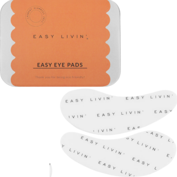 Easy Livin' Easy Eye Pads, reusable silicone eye patches with orange scalloped packaging, two transparent pads.
