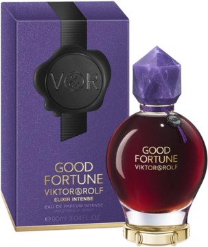Perfumy Good Fortune Elixir Intense Viktor&Rolf: ciemnoczerwona butelka z fioletową nakrętką obok purpurowego pudełka.