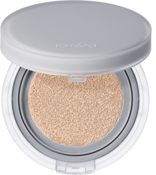Szary, otwarty kompakt Rom&nd Nu Zero Cushion Pure z beżowym podkładem na gąbce, widok z góry.