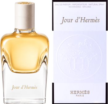 Hermes Jour d'Hermes woda perfumowana, złocista butelka z białym korkiem i białe pudełko z logo, obok siebie.