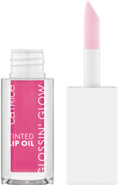 Catrice Glossin' Glow Tinted Lip Oil 040: otwarta butelka z różowym olejkiem i aplikatorem.