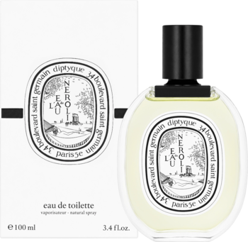 Diptyque L'Eau de Neroli 100ml EDT w okrągłej butelce obok pudełka. Biała etykieta, żółta ciecz, czarna zakrętka.