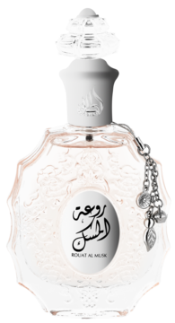 Woda perfumowana Lattafa Rouat Al Musk. Ozdobny, fasetowany flakon z reliefami, przezroczysty, z białą nakrętką i srebrną zawieszką.