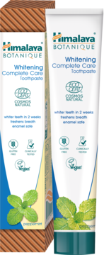 Pasta Himalaya Botanique Whitening Complete Care w białej tubce i pudełku, z zielonymi listkami mięty.