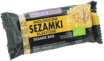 NaturaVena Ekologiczne Sezamki Klasyczne w czarnym opakowaniu, z żółtą etykietą i zielonym logo bio, widok z góry.