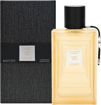 Woda perfumowana Lalique Woody Gold: złota butelka z geometrycznym wzorem, czarna nakrętka i czarne teksturowane pudełko.