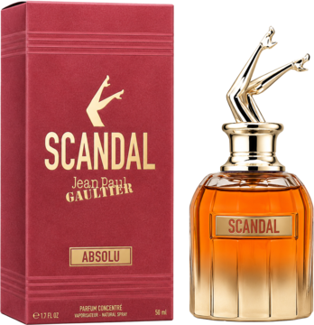 JPG Scandal Absolu perfumy. Butelka z bursztynowym płynem, złotą nakrętką w kształcie nóg i czerwone pudełko obok.