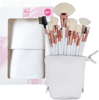 Ilū Basic Set 18 pędzli do makijażu. Białe rączki i różowozłote skuwki w białym etui, obok otwartego pudełka.
