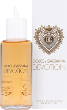 Bursztynowy zapas perfum Dolce & Gabbana Devotion Eau de Parfum w butelce obok białego pudełka ze złotym sercem.
