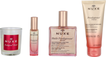 Zestaw Nuxe Happy in Pink: różowo-złoty olejek, perfumy, żel i świeca, ułożone w rzędzie, widok z przodu.
