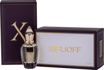 Woda perfumowana Xerjoff Shooting Stars NIO. Przezroczysta butelka z złotą nakrętką obok purpurowego pudełka ze złotym logo.
