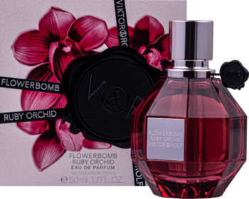 Viktor&Rolf Flowerbomb Ruby Orchid EDP, czerwona butelka-granat z czarną kokardą, obok różowe pudełko z orchideami.