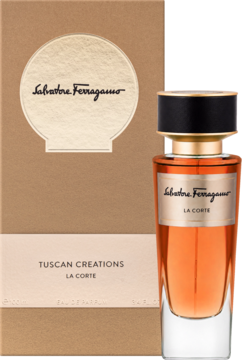 Salvatore Ferragamo Tuscan Creations La Corte EDP unisex. Bursztynowa butelka ze złotym detalem, obok brązowego pudełka.