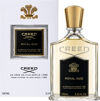 Perfumy Creed Royal Oud unisex, butelka z złotą nakrętką obok białego pudełka z herbem na szarym tle.