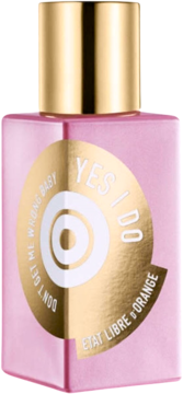 Flakon perfum Etat Libre D'Orange Yes I Do, różowy z błyszczącą złotą etykietą i białą grafiką.