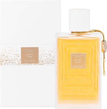 Lalique Infinite Shine damska woda perfumowana w przezroczystej butelce ze złotym płynem i białym korkiem. Obok białe pudełko.