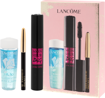 Zestaw makijażowy Lancôme Monsieur Big: tusz, kredka Le Crayon Khôl i płyn Bi-Facil, obok różowego pudełka prezentowego.