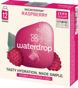 Waterdrop Microdrink Raspberry, białe pudełko z różową grafiką i malinami, witaminowe kostki bez cukru.