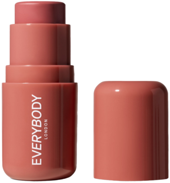 Róż w sztyfcie Everybody London Dusty Pink, otwarty, z widoczną kremową formułą i leżącą obok nakładką.